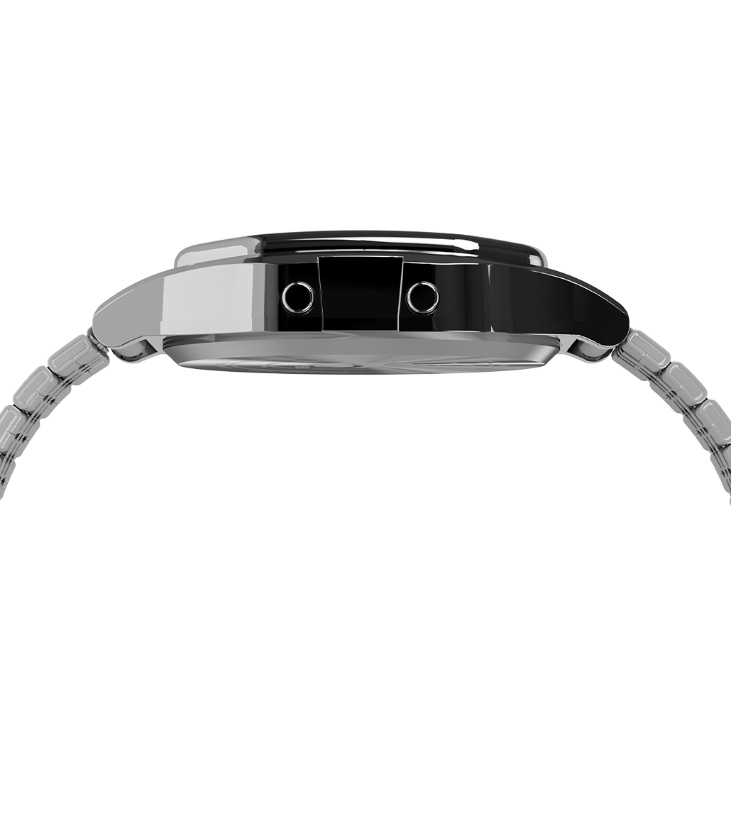 A side profile of the watch, showing the polished stainless steel case and digital button placement.